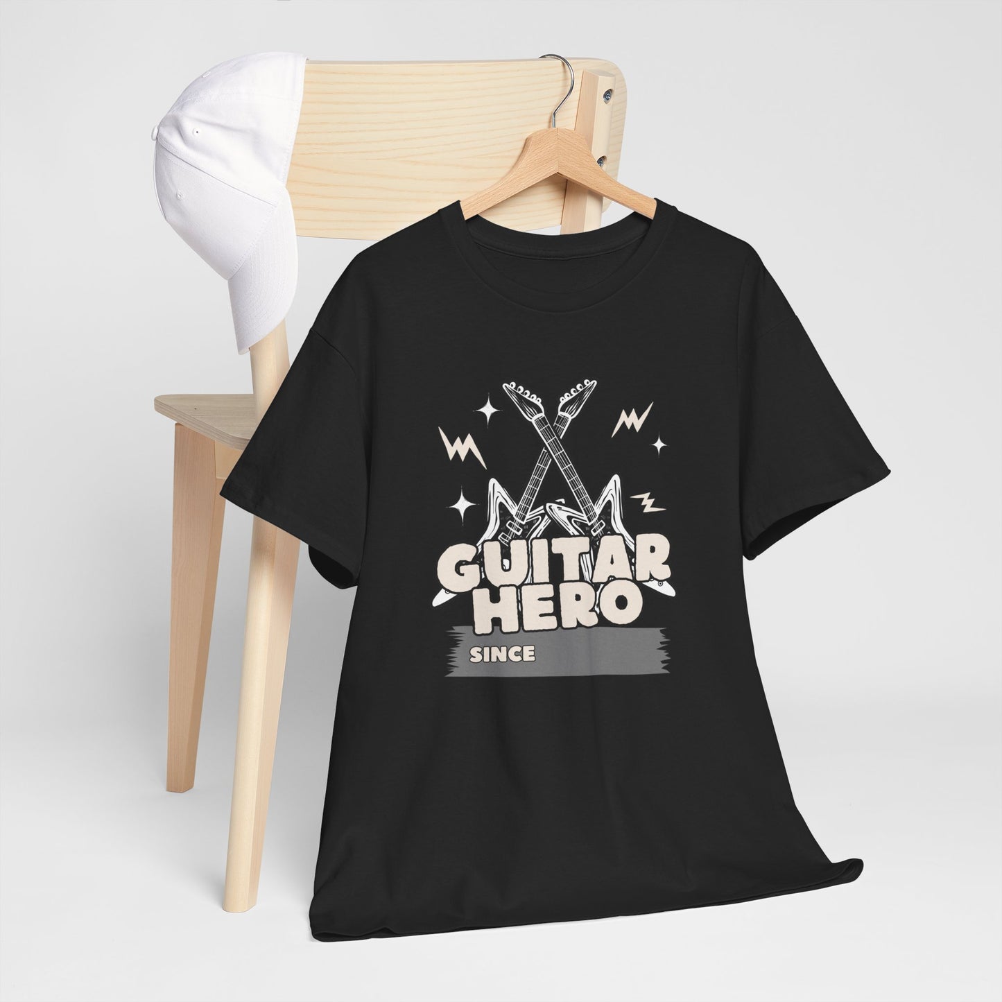 Black customisable t-shirt with 'Guitar Hero Since' design on a wooden hanger against a white background