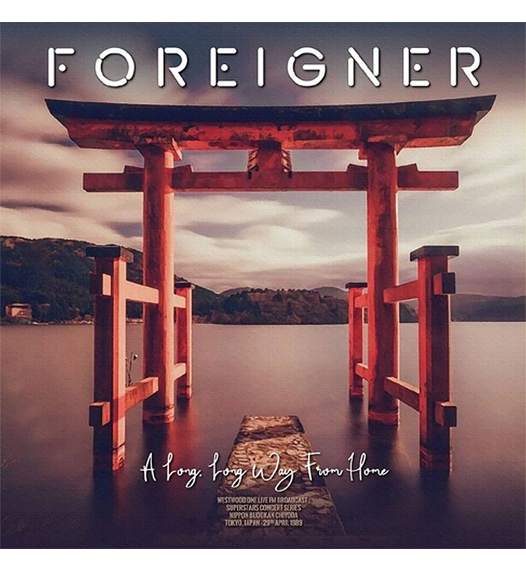 Foreigner ‘A Long Long Way From Home’ vinyl record front cover. The album cover features a serene landscape with a red Torii gate overlooking a calm body of water and distant mountains under a cloudy sky. The text on the cover includes the album title and details: ‘Westwood One Live FM Broadcasts, Superstar Concert Series, Nippon Budokan, Tokyo, Japan, 29th April 1989.’