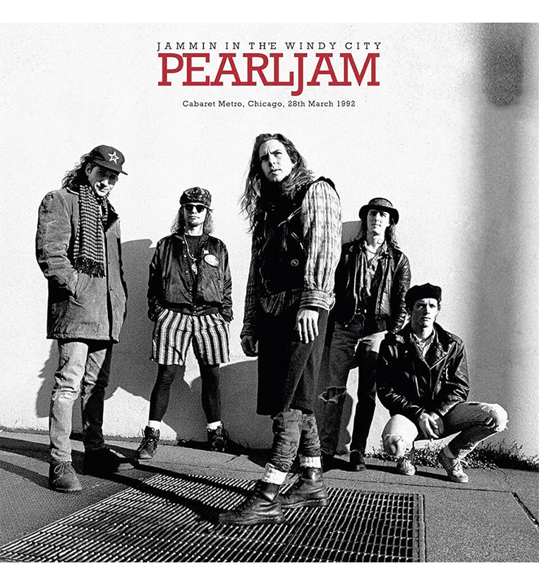 Vinyl record front cover for 'Pearl Jam Jammin’ in the Windy City.' The cover features a black-and-white photo of the band members standing together in a casual, urban setting. The title 'Pearl Jam' is prominently displayed in red letters at the top, with 'Jammin’ in the Windy City' and 'Cabaret Metro, Chicago, 28th March 1992' written below it.